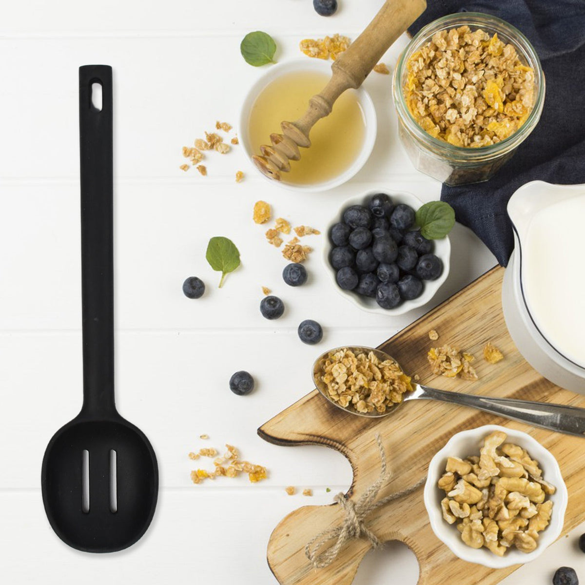 Silicone kitchen spoon in a modern Indian kitchen. Main image
