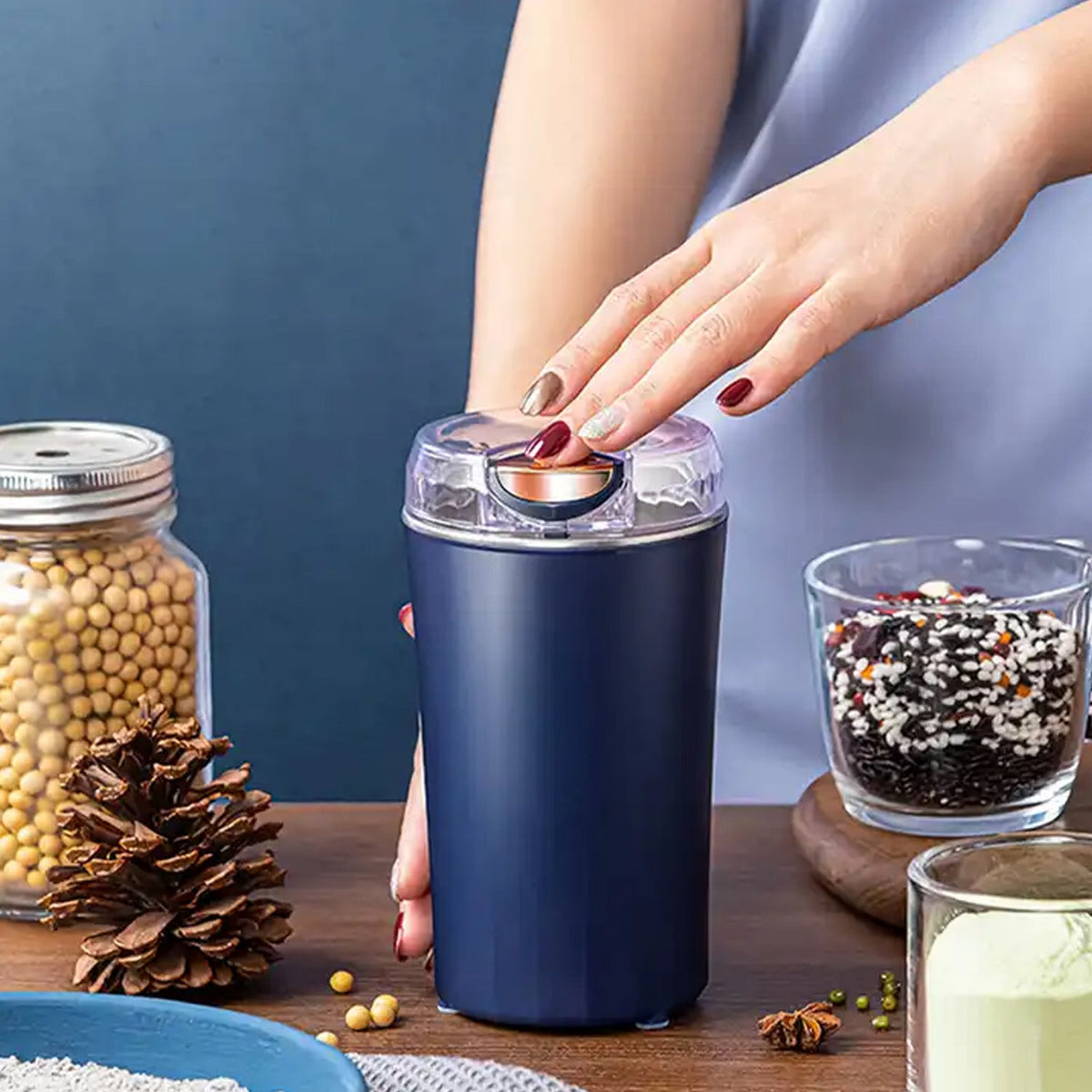 Dabster Coffee Grinder Blender, a compact 4-blade mixer for home use. Main image
