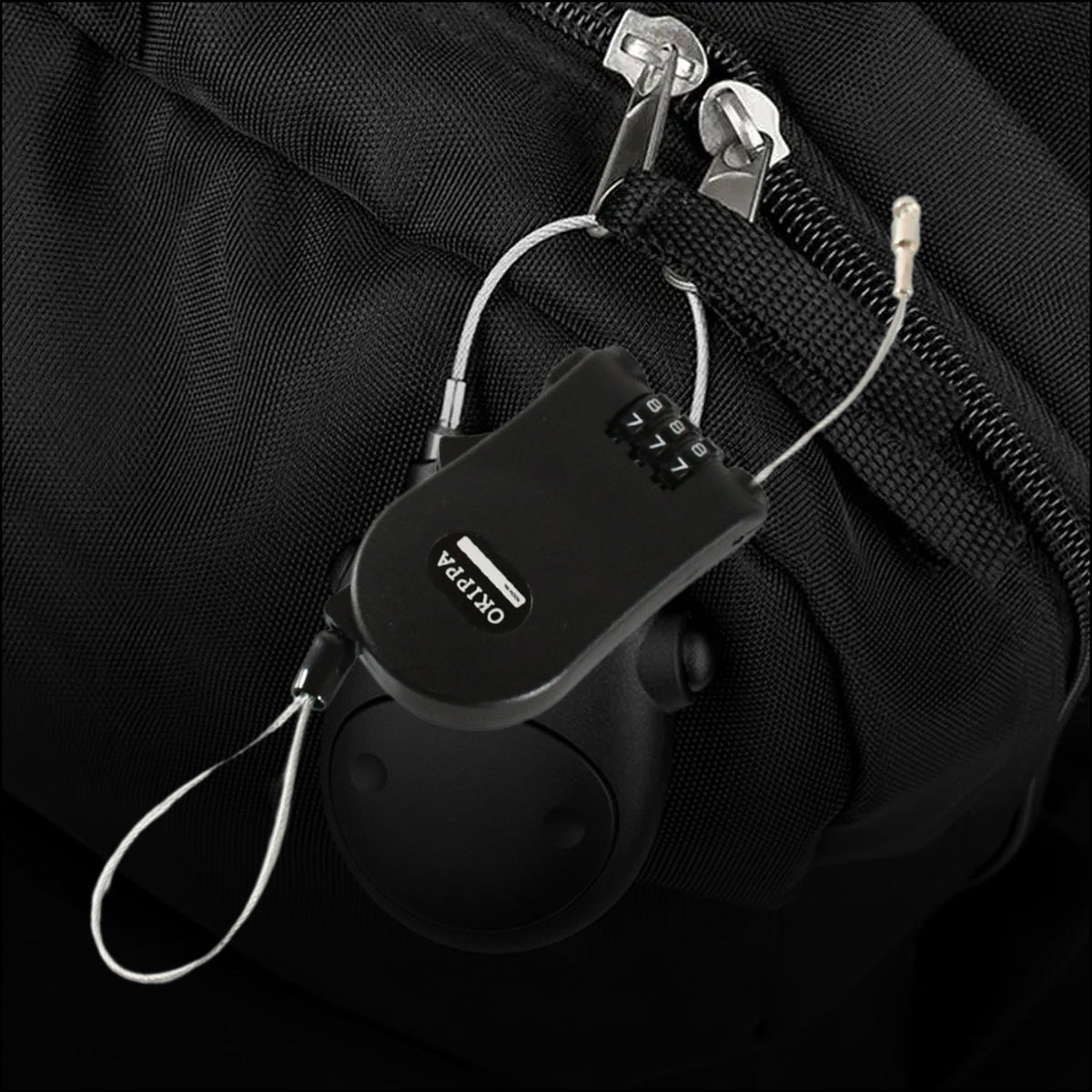 A black retractable cable lock with its wire extended, showcasing the 3-digit combination dials. Main image