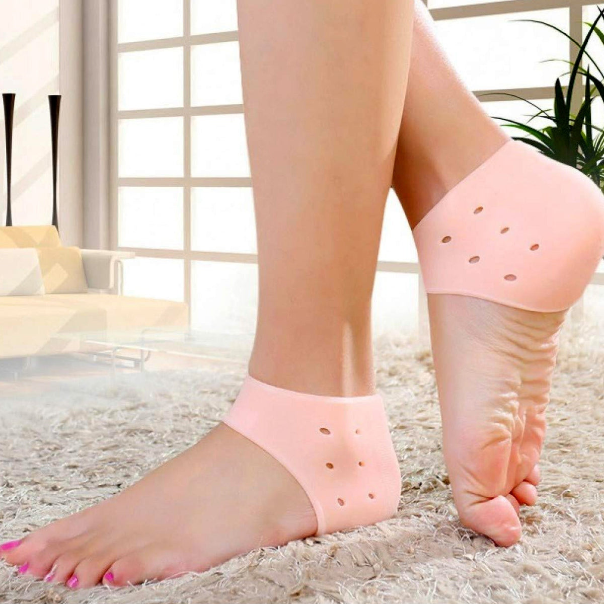 Comfortable silicone gel heel socks providing moisturizing foot care. Main image