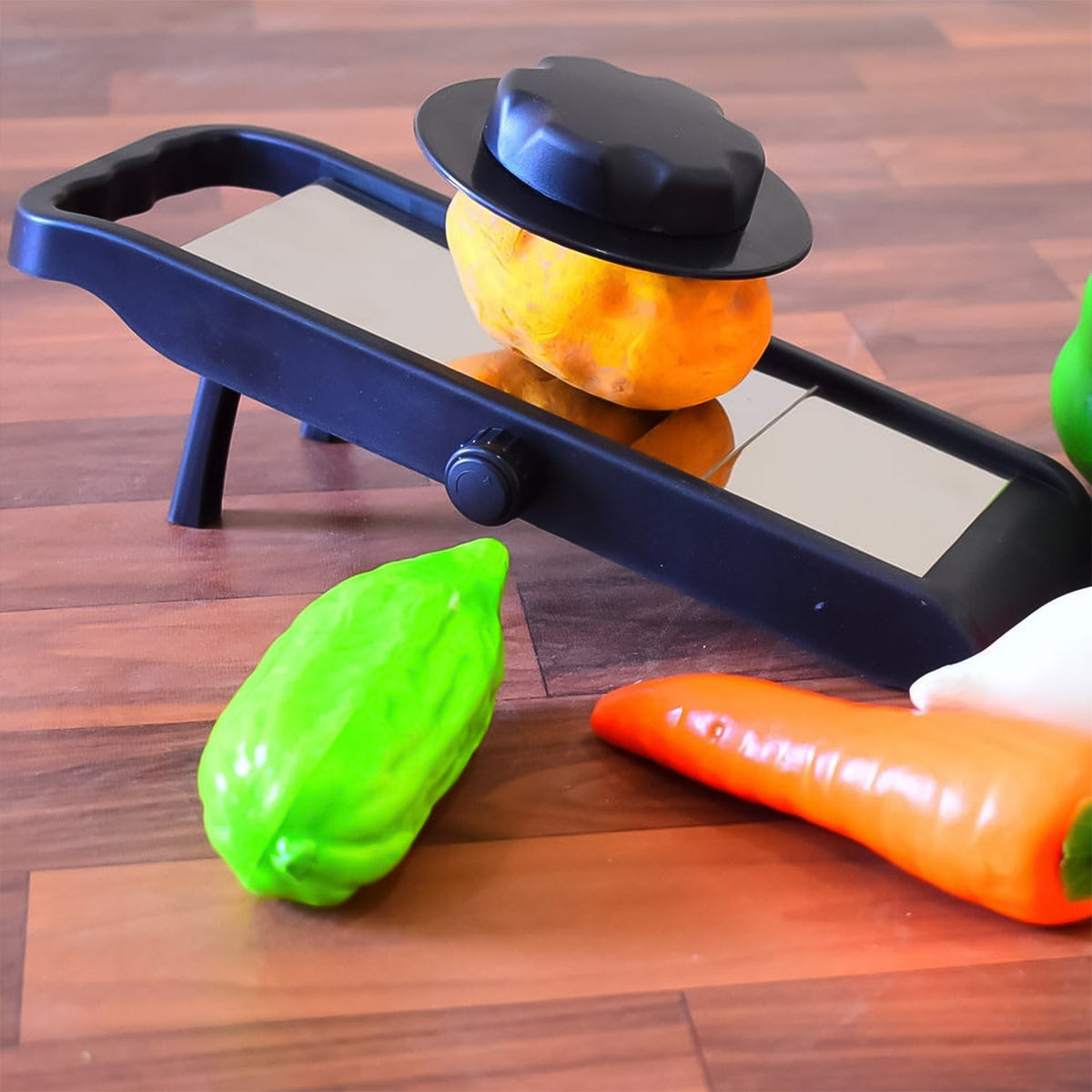 Adjustable vegetable slicer with stainless steel blades for kitchen use. Main image