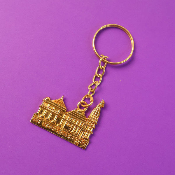 Ram Mandir keychain hanging with keys, showcasing metal craftsmanship