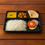 Durable plastic 4-compartment meal tray for portion control and organized dining.