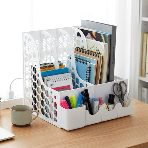 Front compartments of desk organizer for holding pens and stationery supplies.