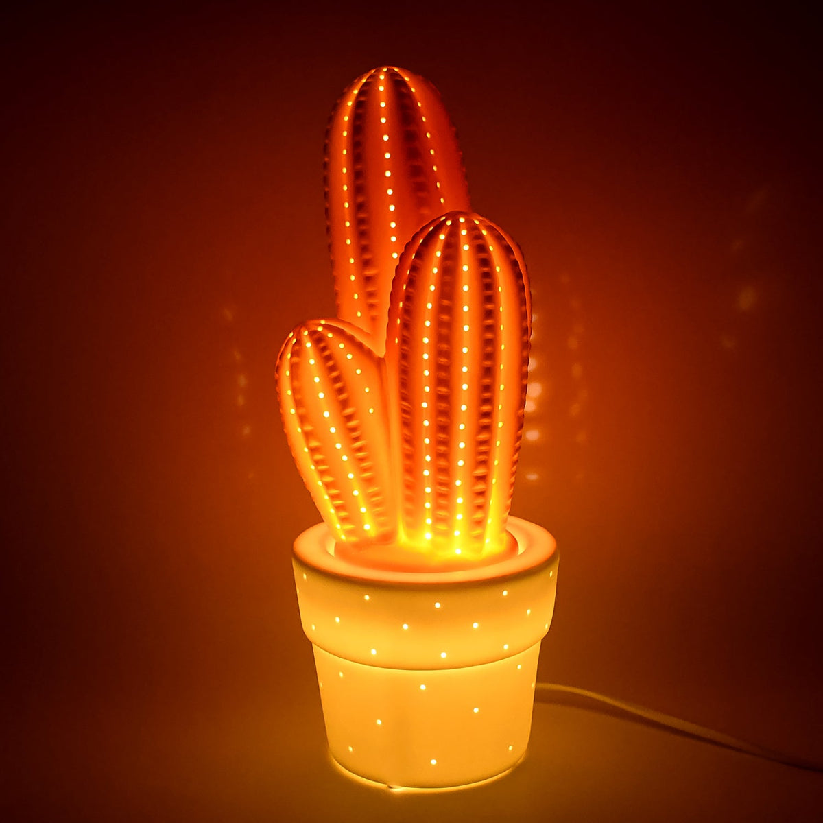 Big ceramic table lamp providing soft ambient light Main image