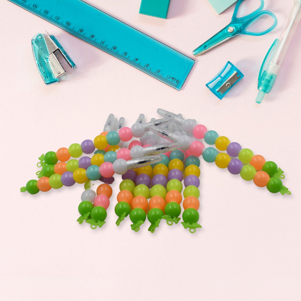 A vibrant 12-piece Pearl Gel Pen Set displayed with assorted colors and pearl designs. Main image