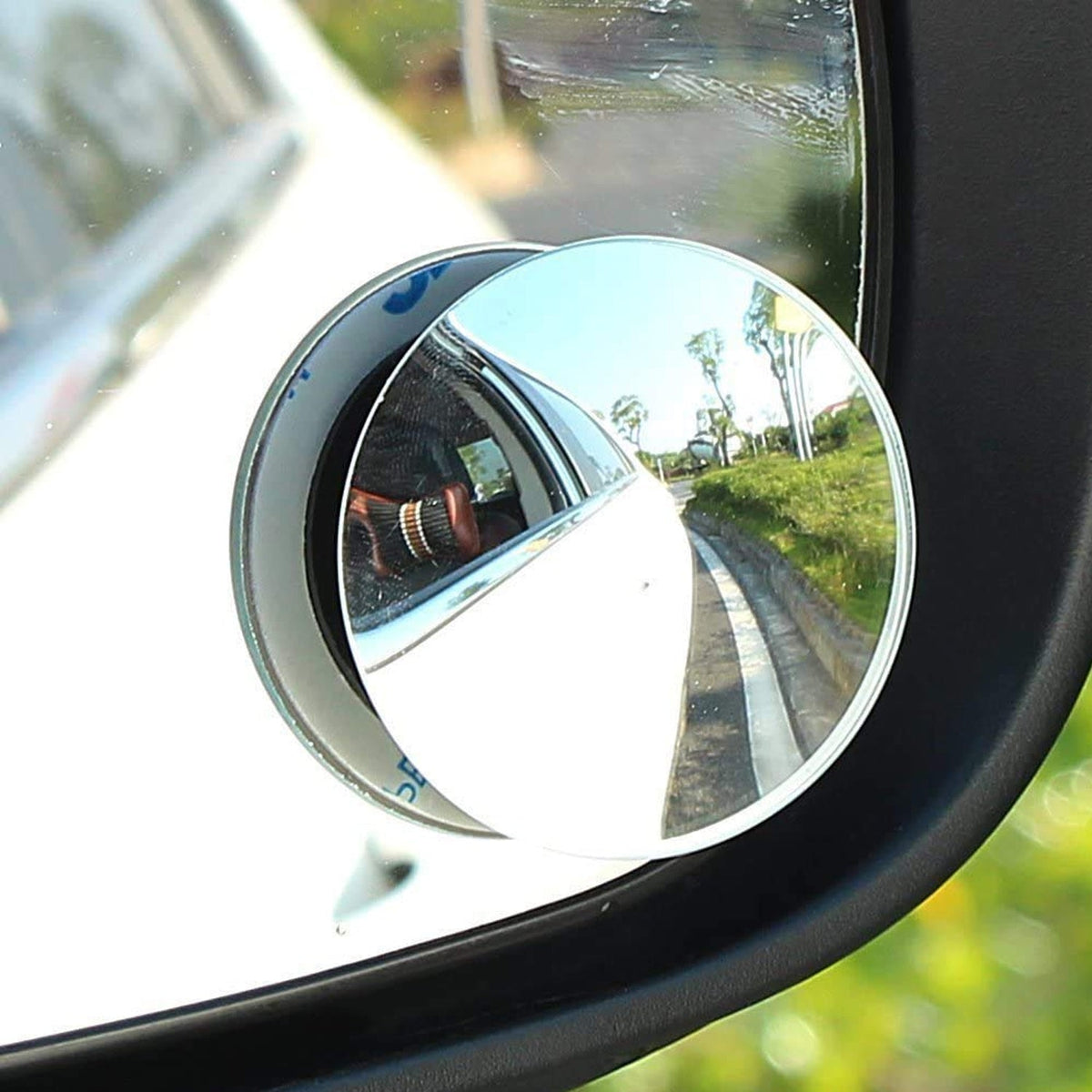 Pair of round wide-angle blind spot mirrors attached to a car's side mirror. Main image