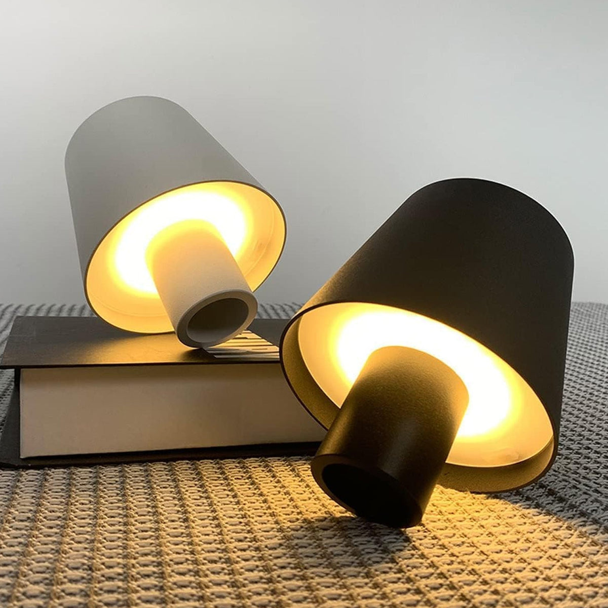 USB rechargeable LED bottle lamp glowing softly on a wooden table, showcasing dimmable light. Main image