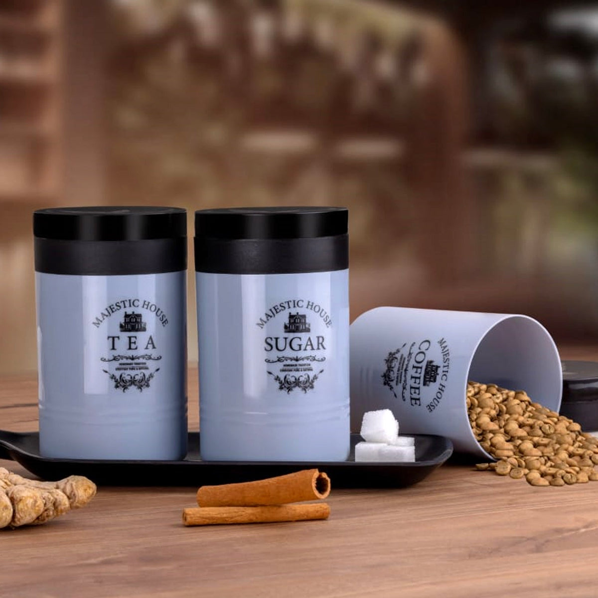 Three plastic damru-shaped airtight containers labeled 'Tea', 'Coffee', 'Sugar' on a white background. Main image