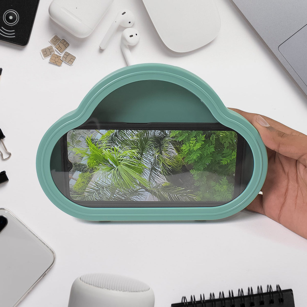 Green waterproof phone holder mounted on a tiled wall, ready for use in a bathroom. Main image