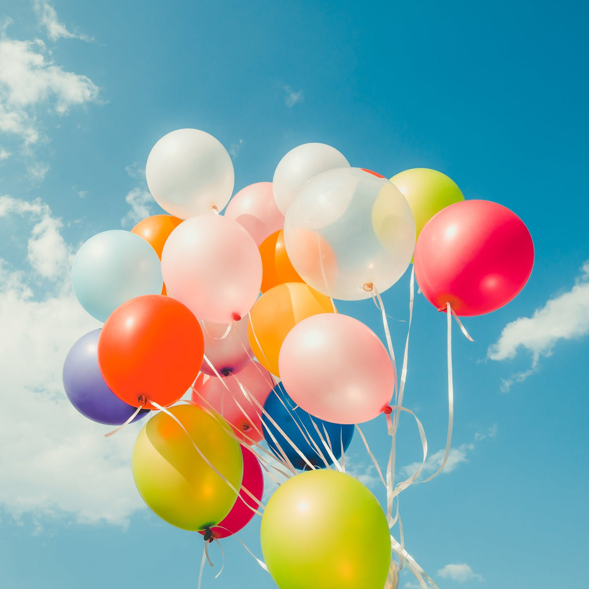 Assortment of vibrant multicolor latex balloons for party decoration. Main image