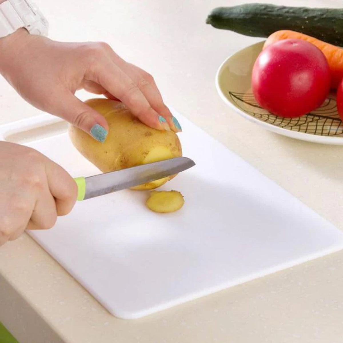 Large plastic chopping board for hygienic kitchen food preparation. Main image