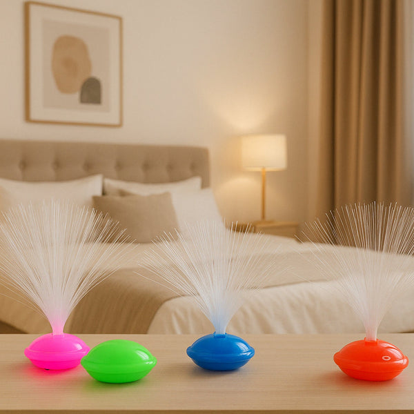 Decorative fiber optic LED night lamps glowing in multiple colors