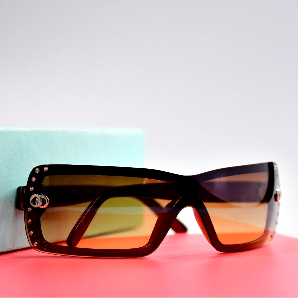 Retro Driving Sunglasses with golden vintage fashion frame on a white background. Main image