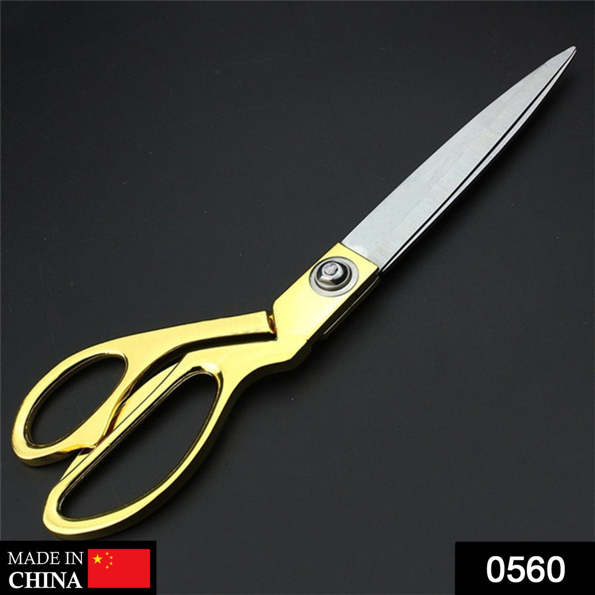 Close-up of Cisora's gold-plated cloth cutting scissors with sharp stainless steel blades. Main image