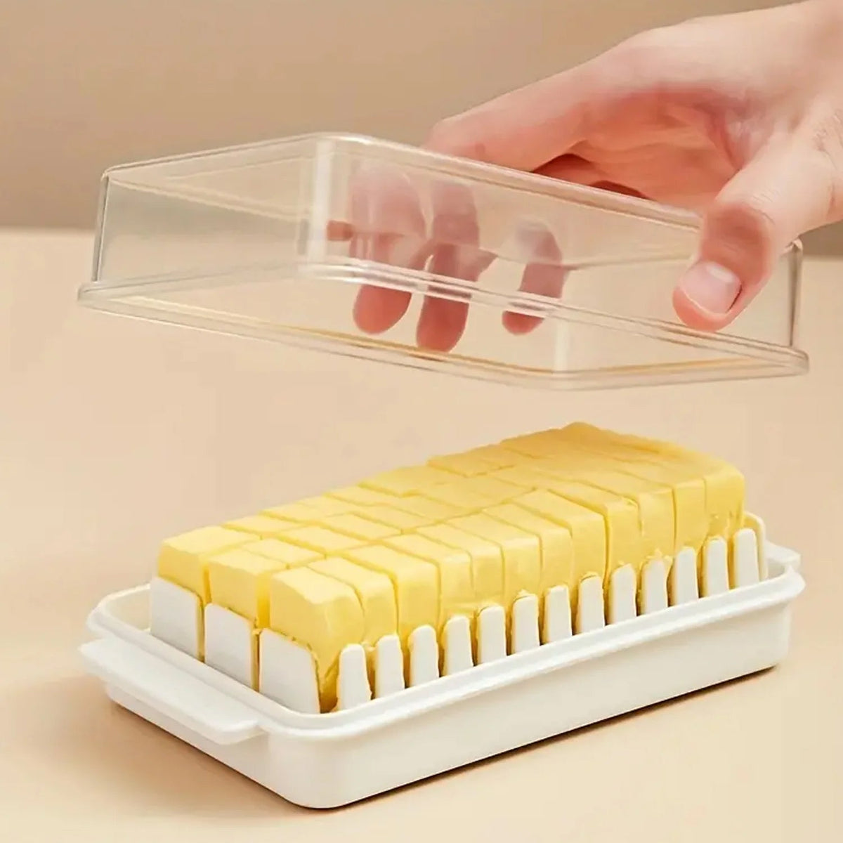 Front view of the transparent Butter Slicer Box by Organivo, ready for use. Main image