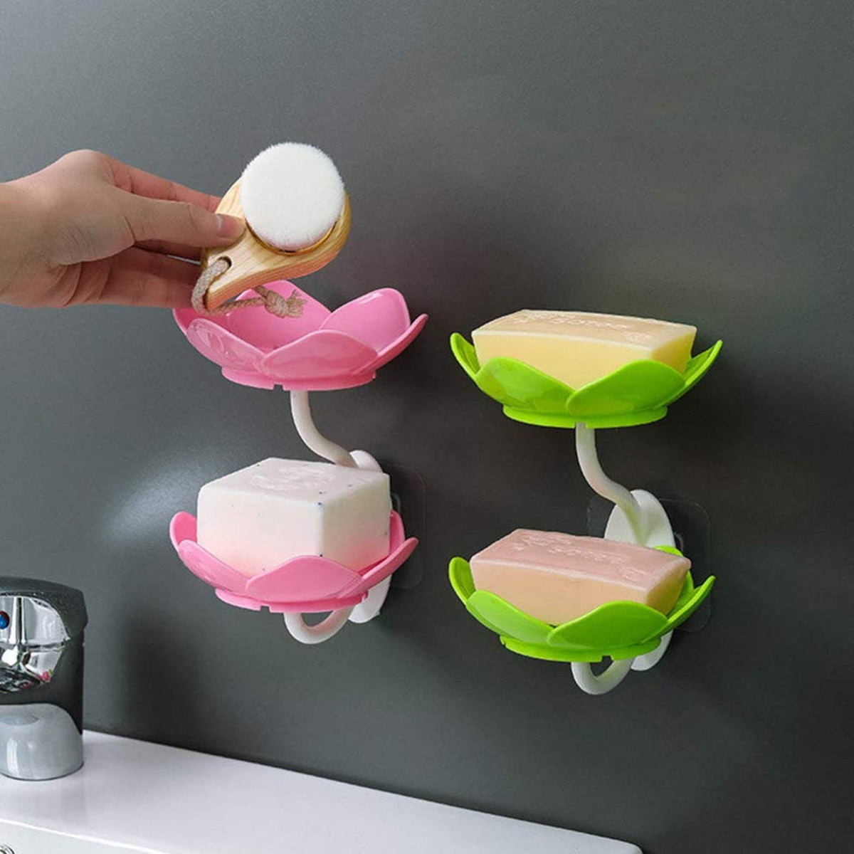 White flower-shaped self-draining soap dish holder with suction cup for bathroom use. Main image