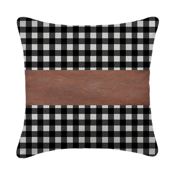 Elegant design of a faux leather and cotton pillow cover enhancing a bedroom.