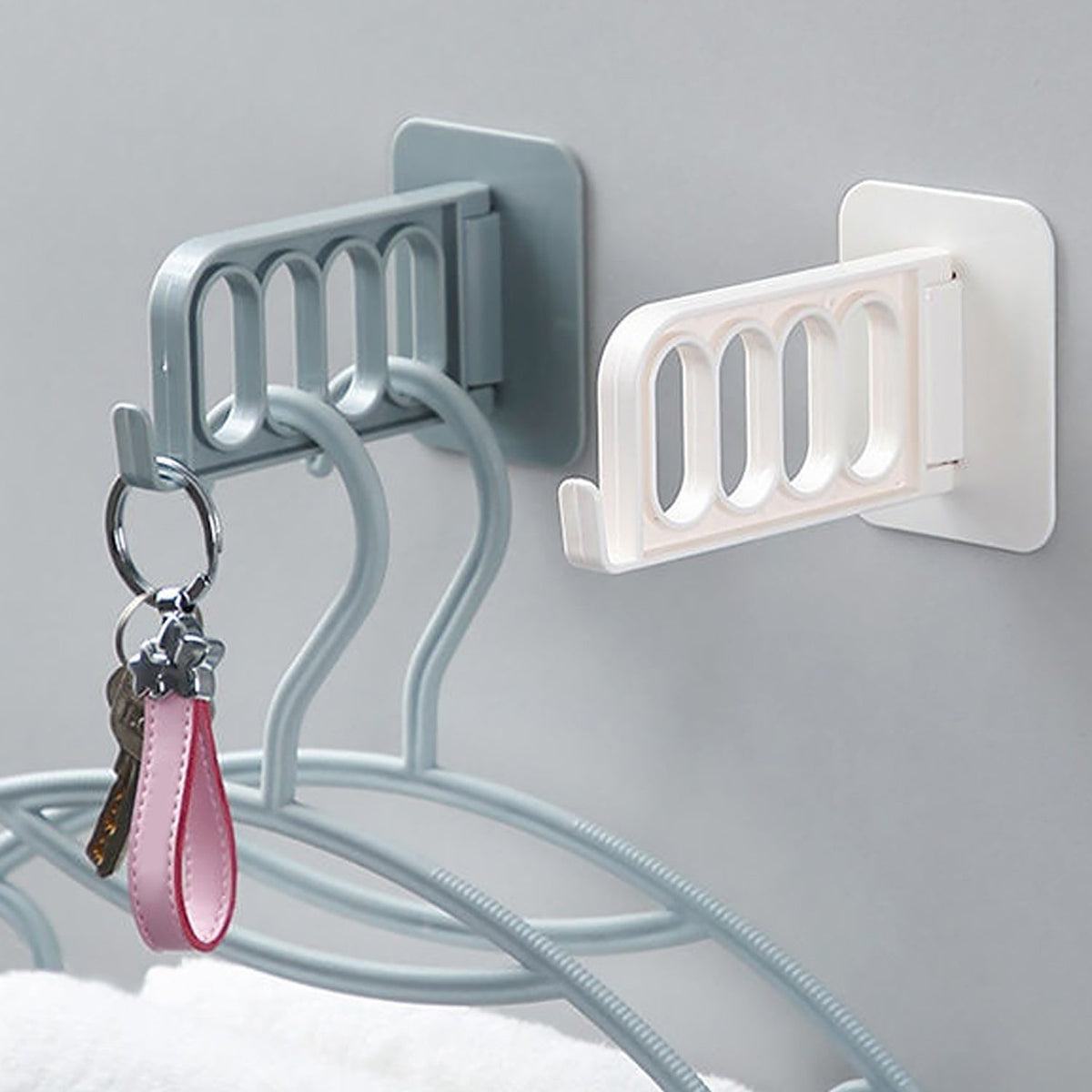 Single ABS plastic door hook for bathroom, kitchen, or bedroom storage. Main image