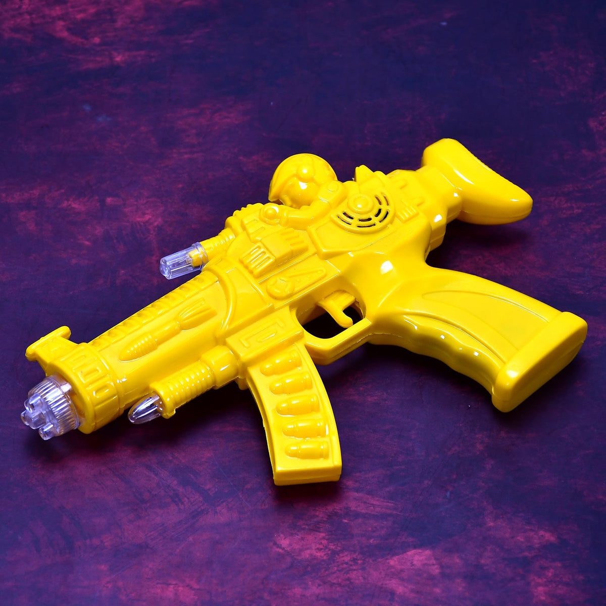 Front view of the Musical Transparent Toy Gun with glowing gears and rainbow lights. Main image