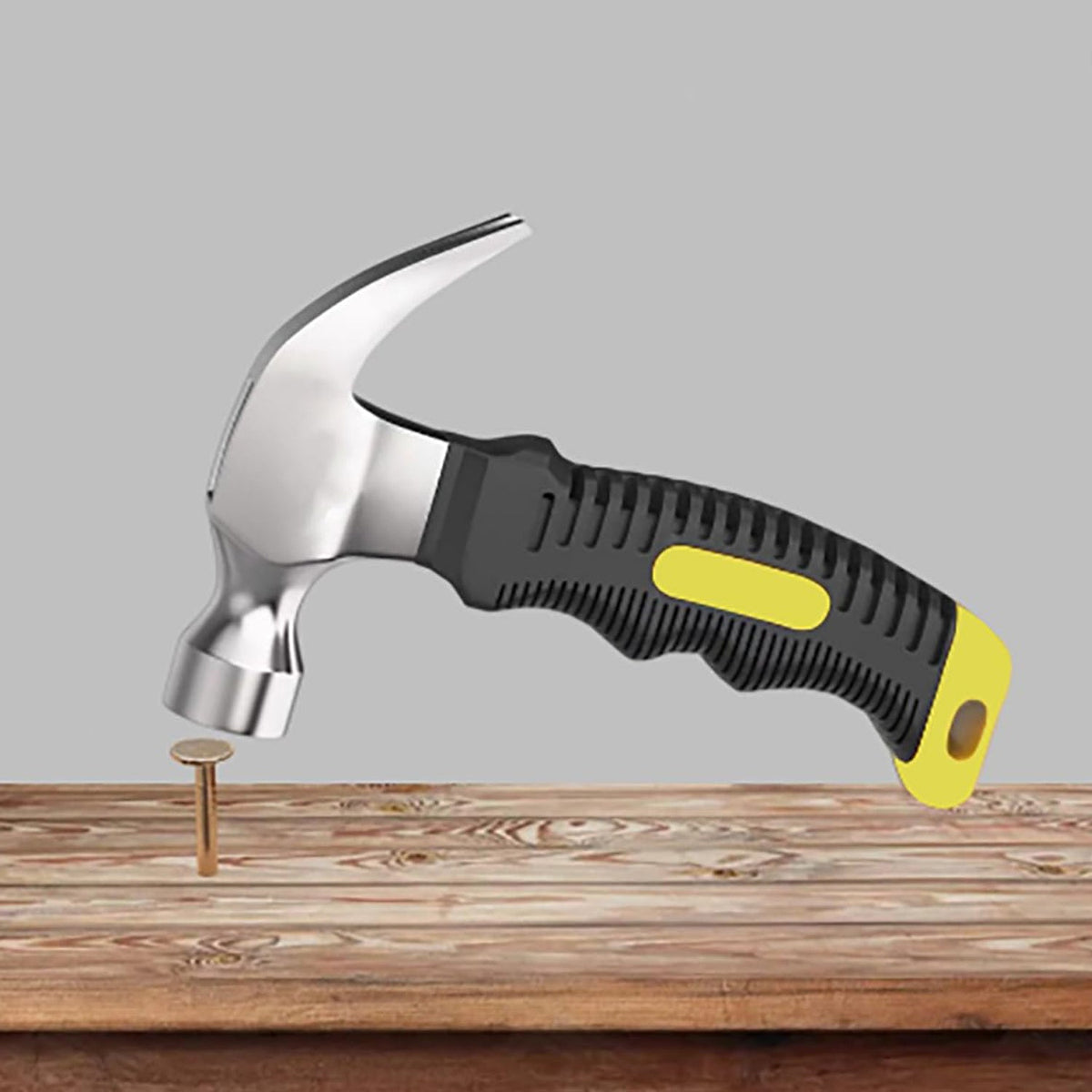 Compact camping hammer with a non-slip handle, ideal for outdoor use. Main image