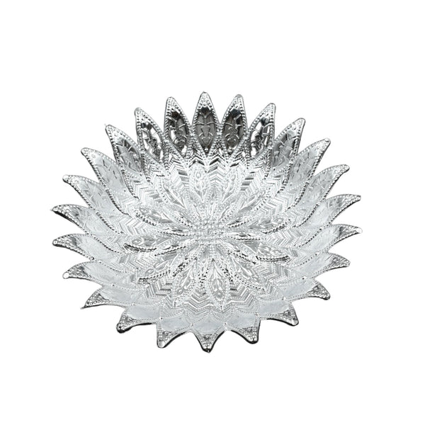Elegant plastic serving tray with a silver finish, viewed from a top angle on a table.