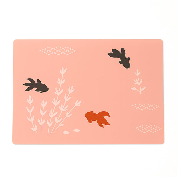 Set of four stylish dining placemats with fish patterned design