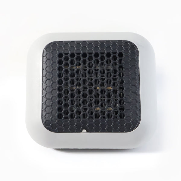 Small room warmed by the compact 600W plug-in wall-mounted room heater
