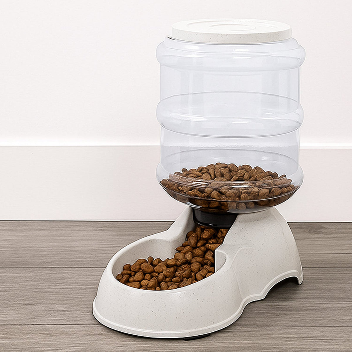 White automatic pet food dispenser with clear food storage bottle for dry kibble Main image