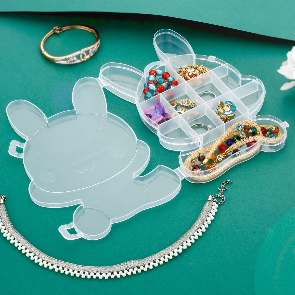Transparent plastic storage box featuring a cheerful cartoon bear design. Main image