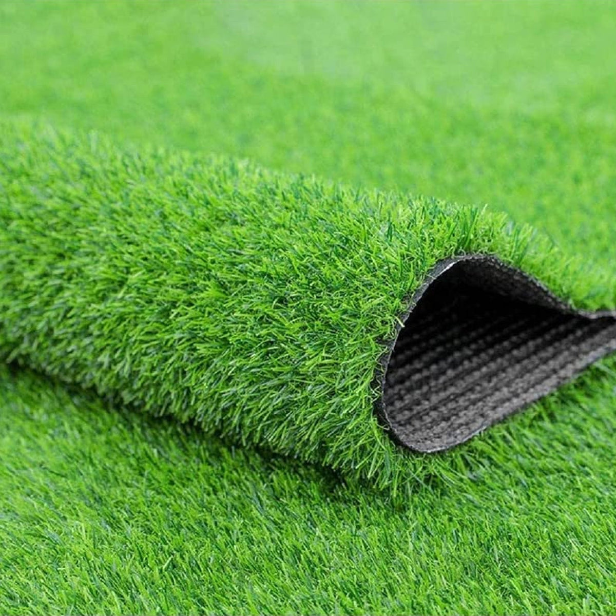 Close-up of the textured surface of the 58x38cm Artificial Grass Mat. Main image