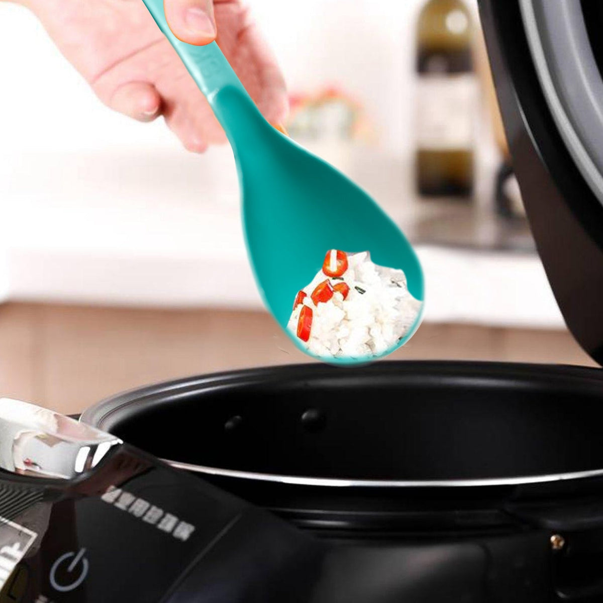 Close-up of a durable BPA-free plastic serving spoon with a smooth finish, ideal for kitchen use. Main image