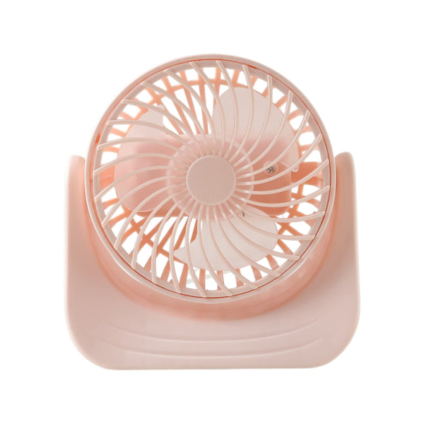 User enjoying cooling from silent mini desktop fan at workspace