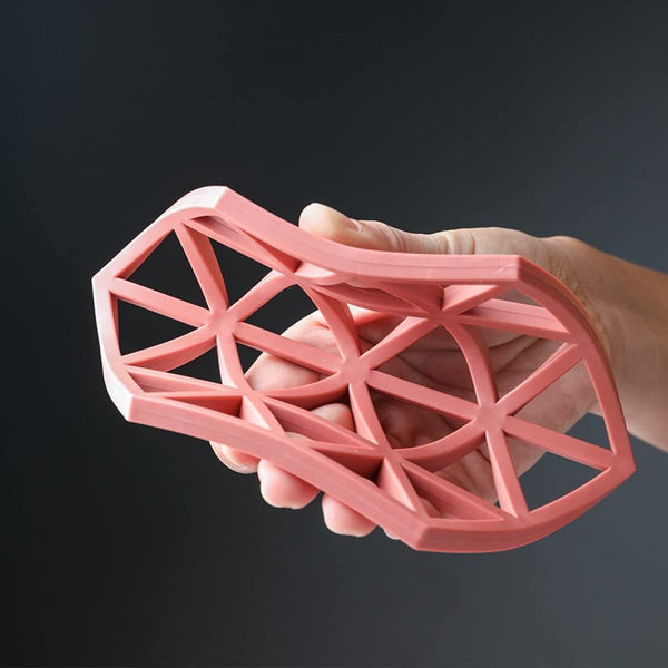Non-slip PVC pot mat with a hollow design, ideal for high heat resistance.