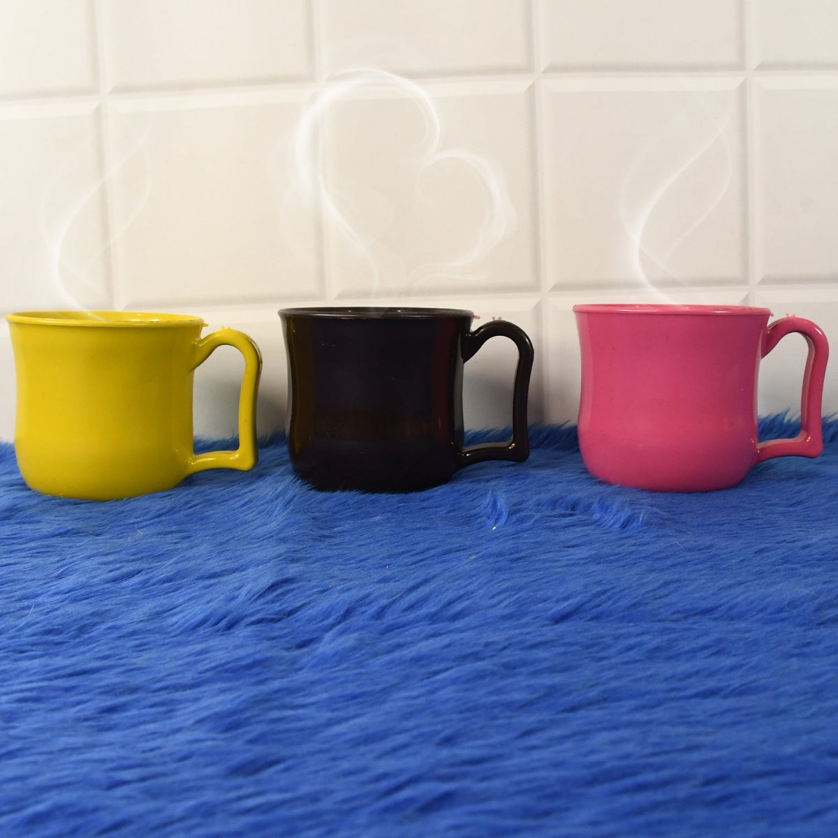 A vibrant plastic coffee mug with handle, showcasing mixed colors for everyday use. Main image