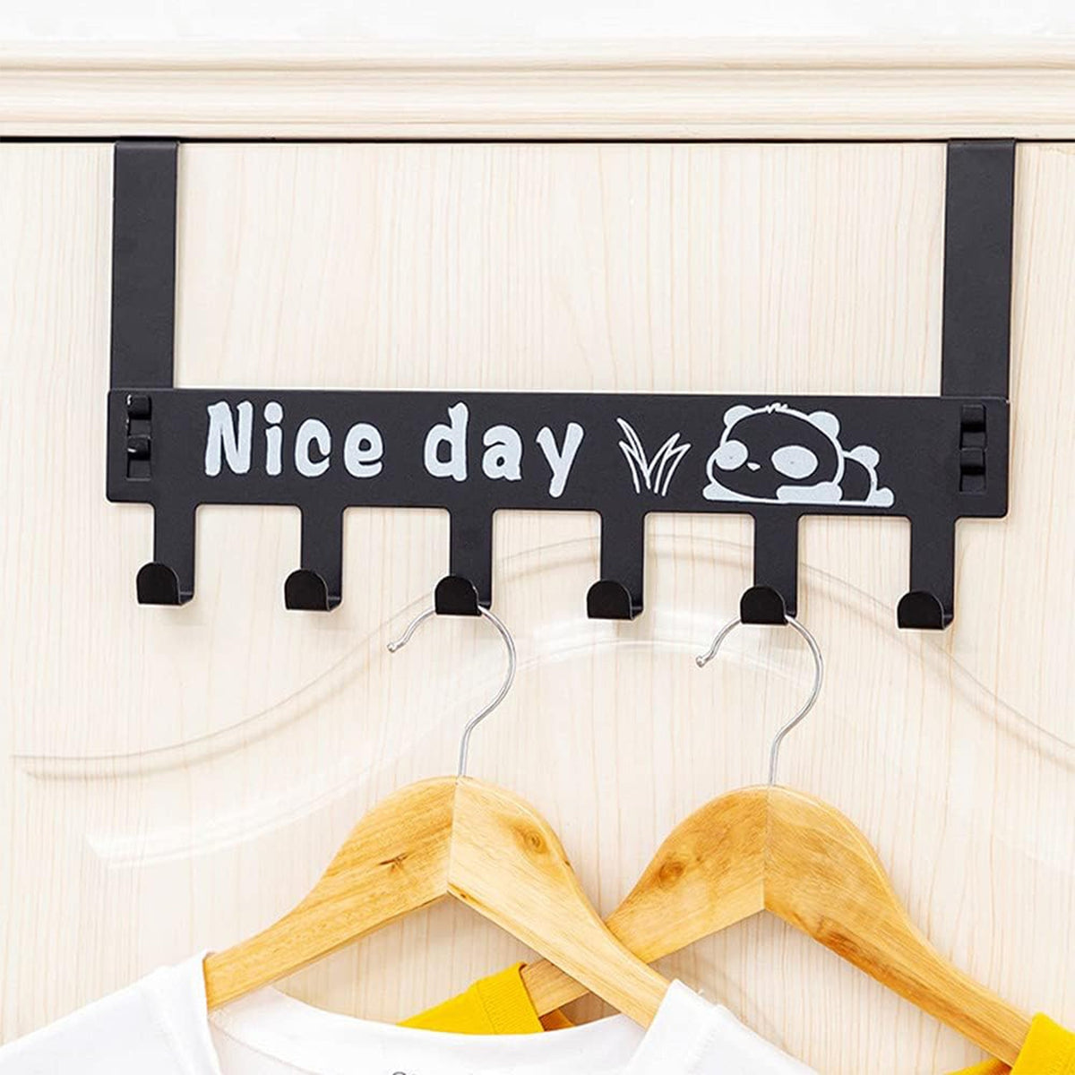 Panda over door hook rack organizing towels on a white door, showcasing practical use. Main image