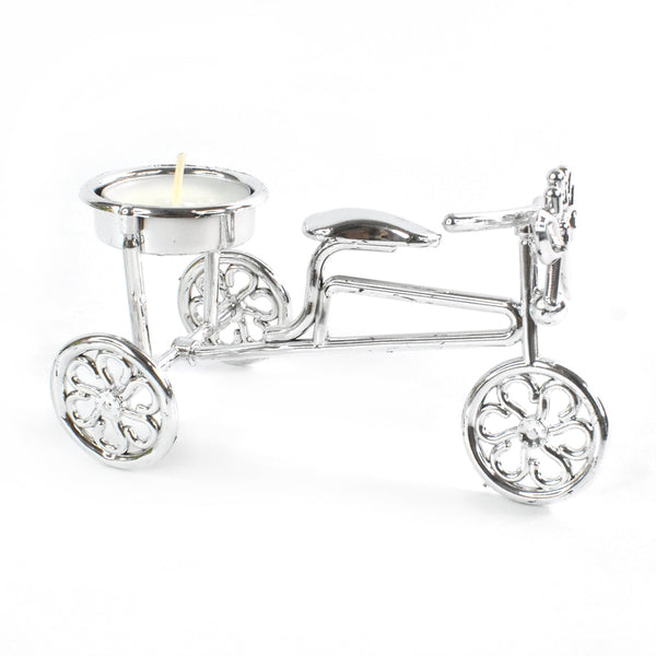 Decorative cycle tealight stand with candle enhancing living space ambiance
