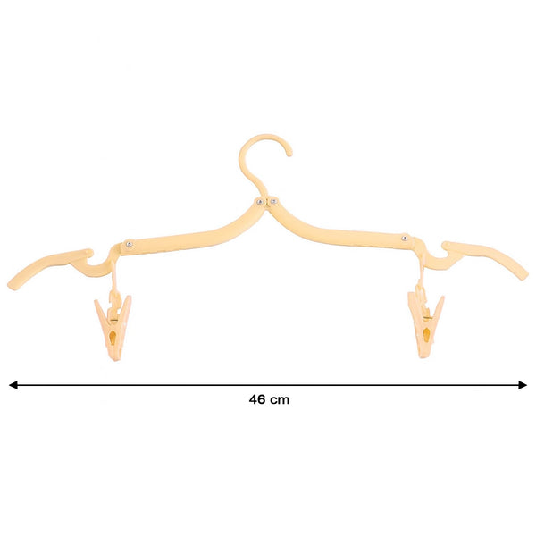 Close-up of dual clips on an adjustable folding clothes hanger
