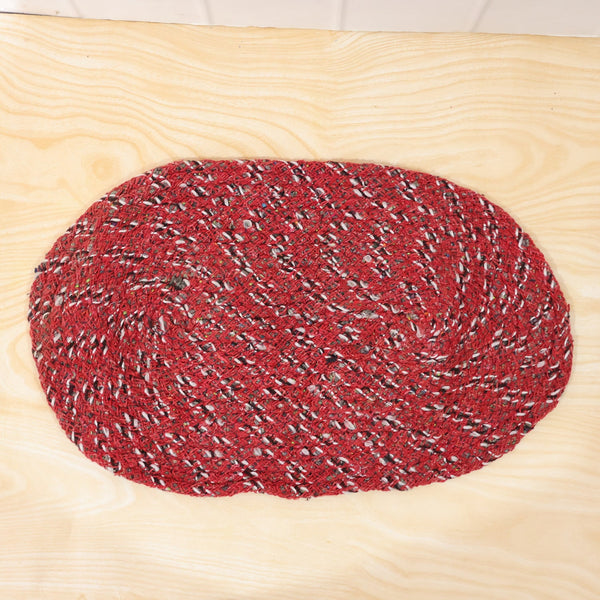 Detail shot of textured red floor mat for indoor use