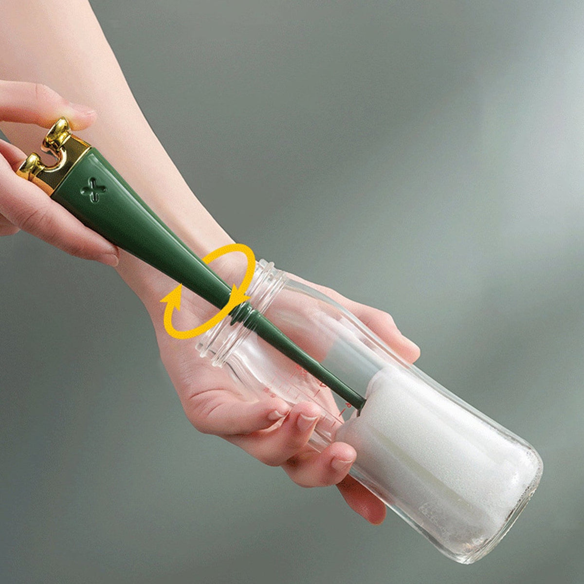 Silicone bottle cleaning brush with a long plastic handle and foam head for deep cleaning. Main image