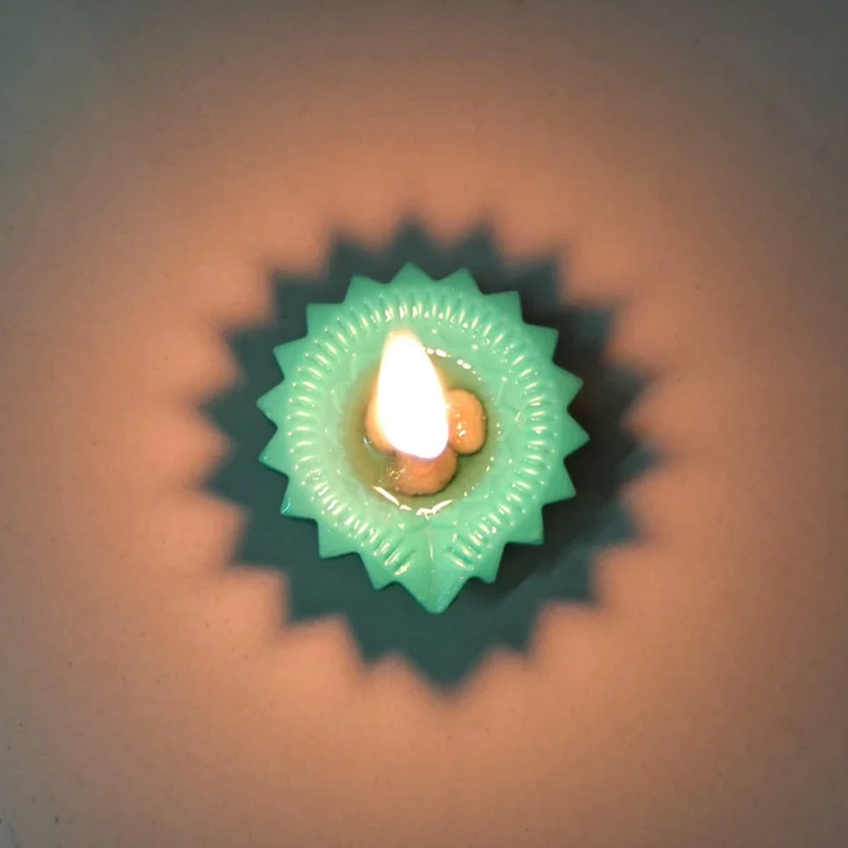 A colourful silicone diya glowing brightly for Diwali celebrations, enhancing festive decor. Main image