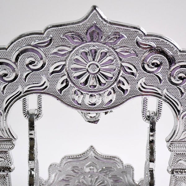 Elegant silver-coated Bal Gopal Jhula enhancing pooja room décor
