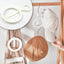 Multi-purpose Closet Organizer Hanger for neatly storing hats, scarves, and bags.