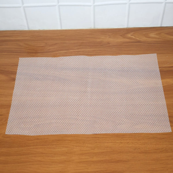 Close-up shot showing the textured surface of the refrigerator mat