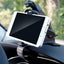 PHOBIA leopard car phone holder securely gripping a smartphone on a car dashboard.