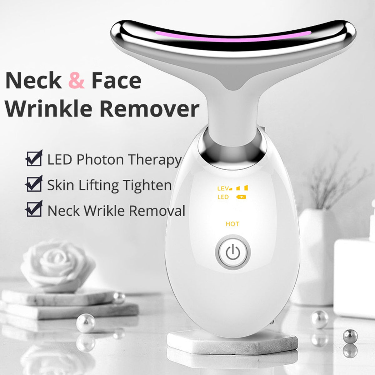 Electric face massager with LED lights in hand Main image