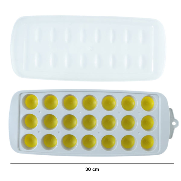 Whiskey ice balls in round ice mold tray