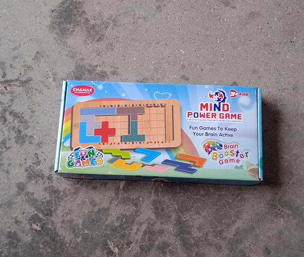 Toddler playing with the wooden mind game, focusing on problem-solving.