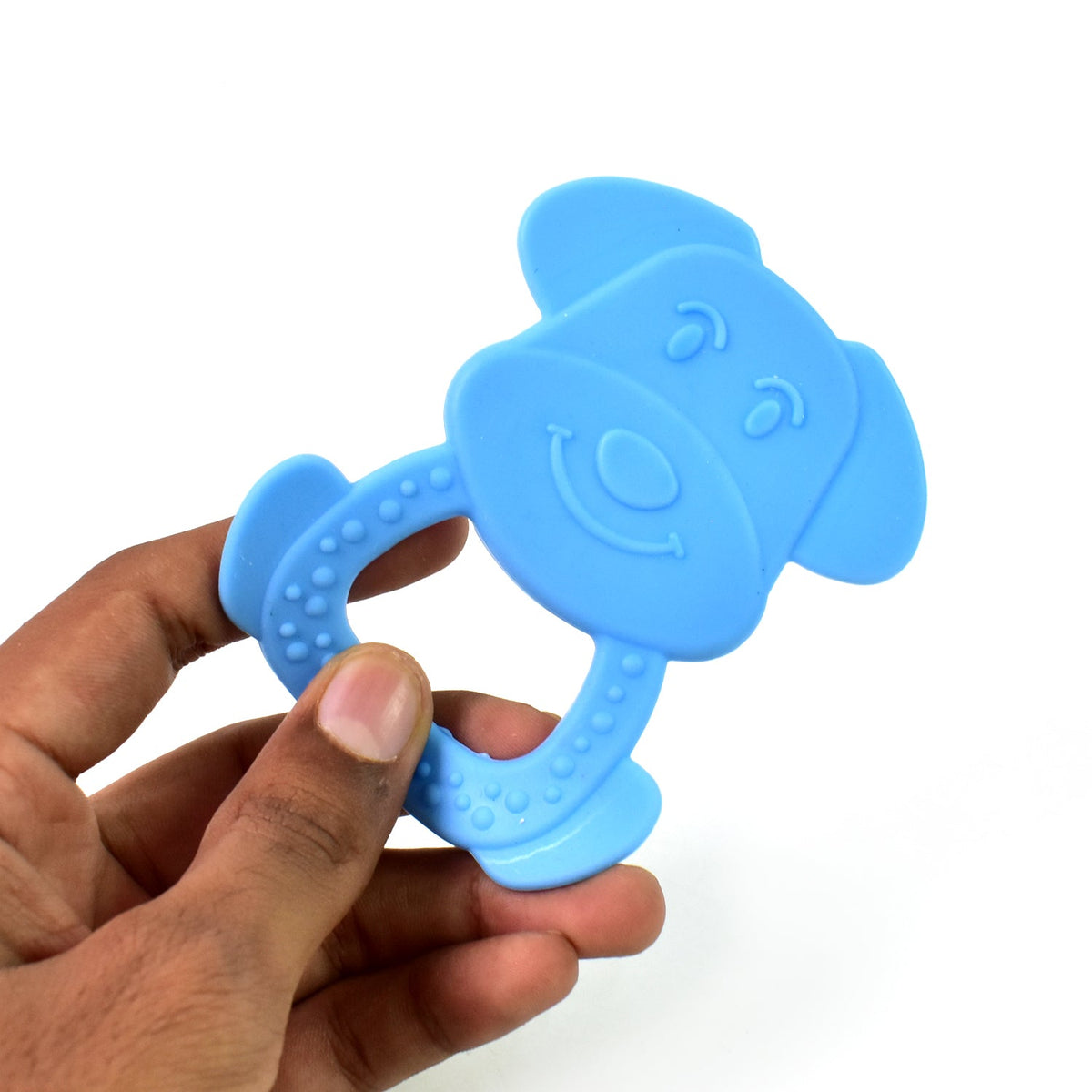 A baby chews on a yellow silicone baby teether, finding comfort during teething. Main image