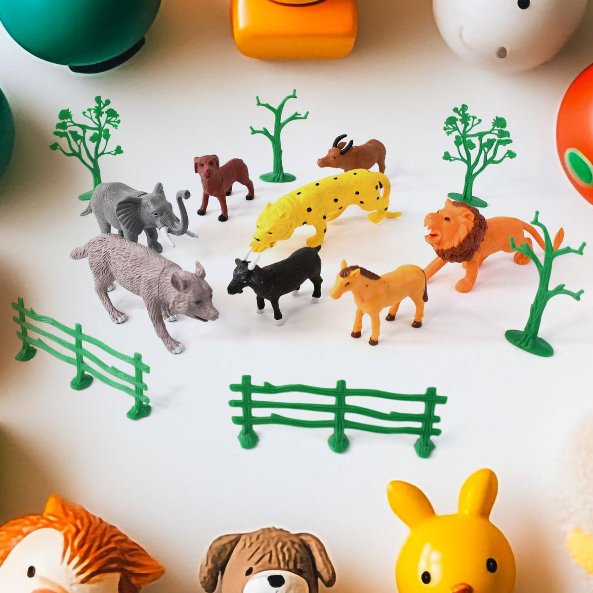 14-piece Animal Kingdom toy set featuring realistic wild animals, trees, and fences Main image